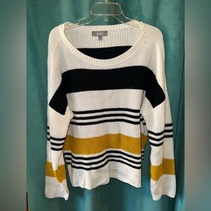 Sweater **has small stain